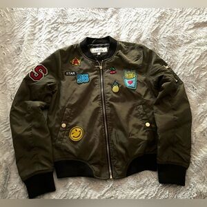 Olive green bomber jacket with fun patches. NWOT